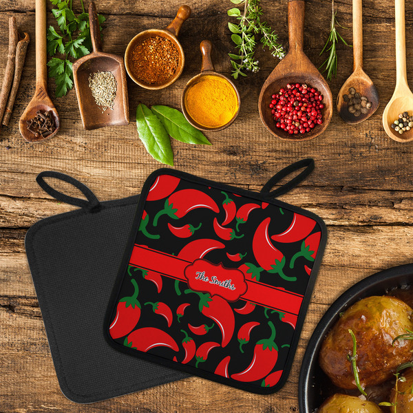 Chili Peppers Neoprene Pot Holder - Set of 2  LIFESTYLE (Flatlay)