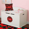 Chili Peppers Round Wall Decal on Toy Chest