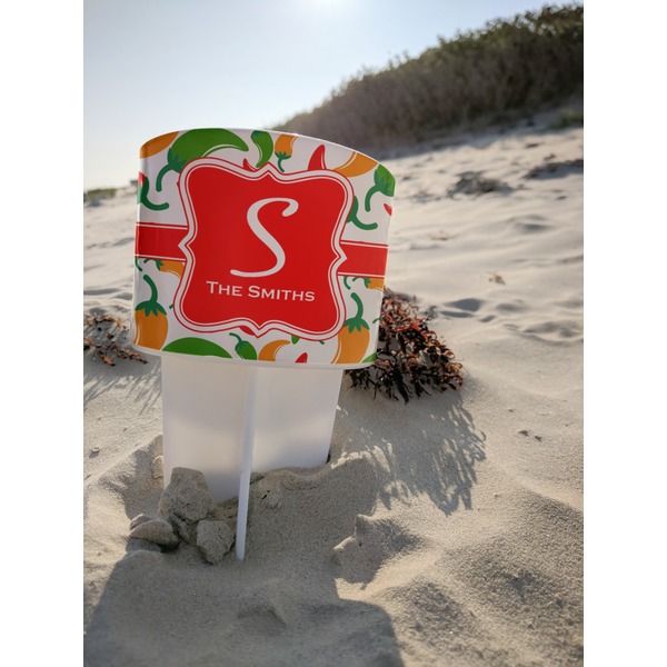 Colored Peppers Beach Spiker white on beach with sand