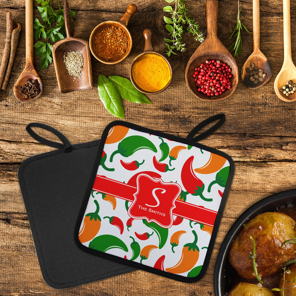Colored Peppers Neoprene Pot Holder - Set of 2  LIFESTYLE (Flatlay)