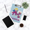 Girl Flying on a Dragon Clipboard - Lifestyle Photo