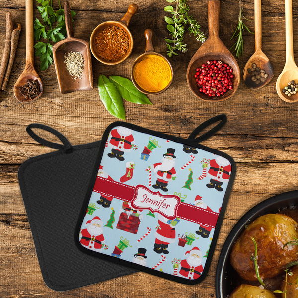 Santa and Presents Neoprene Pot Holder - Set of 2  LIFESTYLE (Flatlay)