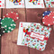 Santa and Presents On Table with Poker Chips