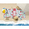 Santas w/ Presents Beach Towel Lifestyle