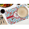 Christmas Penguins Octagon Placemat - Single front (LIFESTYLE) Flatlay