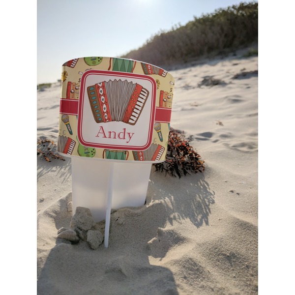 Vintage Musical Instruments Beach Spiker white on beach with sand