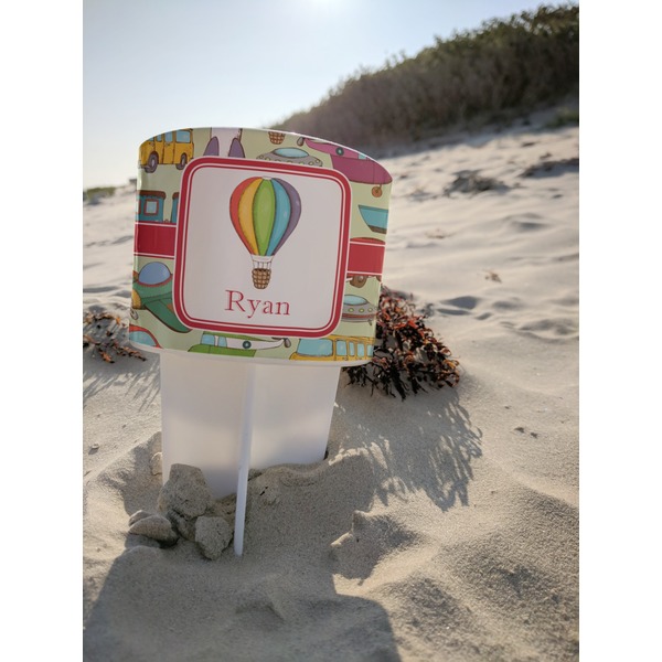 Vintage Transportation Beach Spiker white on beach with sand