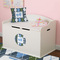 Blue Argyle Round Wall Decal on Toy Chest