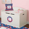 Buoy & Argyle Print Round Wall Decal on Toy Chest