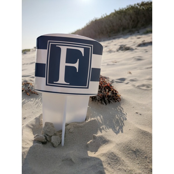 Horizontal Stripe Beach Spiker white on beach with sand