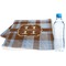 Two Color Plaid Sports Towel Folded with Water Bottle