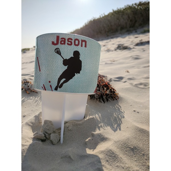 Lacrosse Beach Spiker white on beach with sand