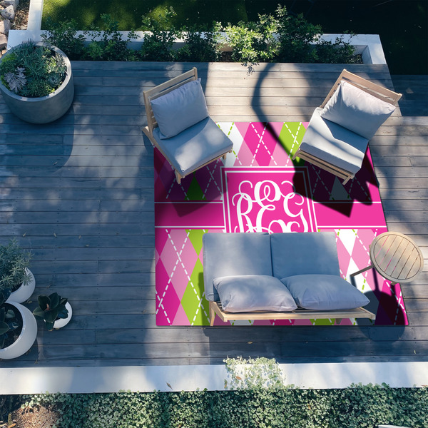 Pink & Green Argyle 8'x10' Patio Rug - In context