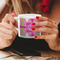 Pink & Green Argyle Espresso Cup - 6oz (Double Shot) LIFESTYLE (Woman hands cropped)