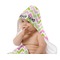 Pink & Green Geometric Baby Hooded Towel on Child