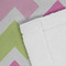 Pink & Green Geometric Close up of Fabric