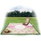 Pink & Green Geometric Picnic Blanket - with Basket Hat and Book - in Use