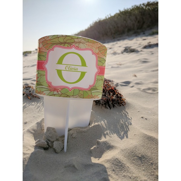 Lily Pads Beach Spiker white on beach with sand