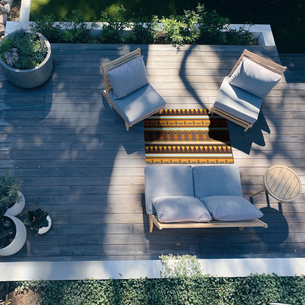 African Masks 3'x5' Patio Rug - In Context