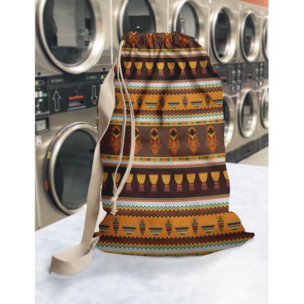African Masks Laundry Bag in Laundromat