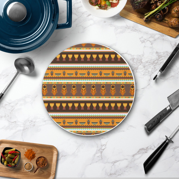 African Masks Round Stone Trivet - In Context View