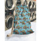 Mosaic Fish Laundry Bag in Laundromat