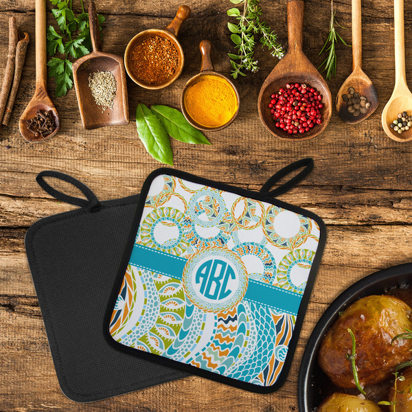 Teal Circles & Stripes Neoprene Pot Holder - Set of 2  LIFESTYLE (Flatlay)