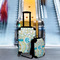 Teal Circles & Stripes Suitcase Set 4 - IN CONTEXT