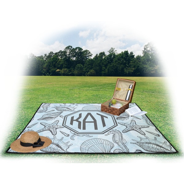 Sea-blue Seashells Picnic Blanket - with Basket Hat and Book - in Use