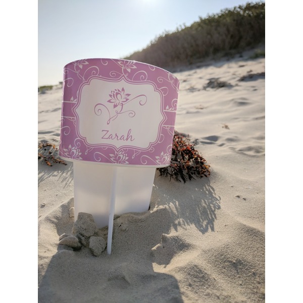 Lotus Flowers Beach Spiker white on beach with sand