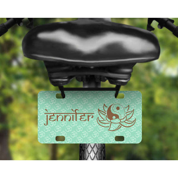 Om Mini License Plate on Bicycle