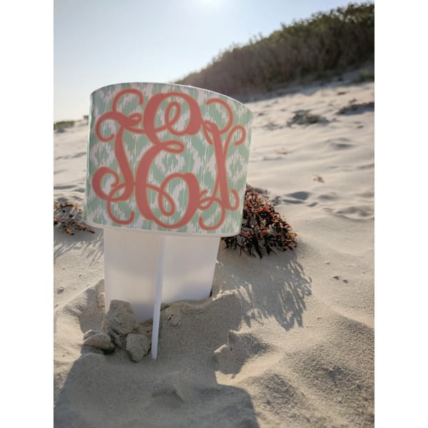 Monogram Beach Spiker white on beach with sand
