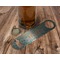 Teal Ribbons & Labels Bottle Opener - In Use