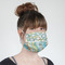 Teal Ribbons & Labels Mask - Quarter View on Girl