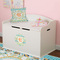 Teal Ribbons & Labels Round Wall Decal on Toy Chest