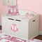Pink Camo Round Wall Decal on Toy Chest