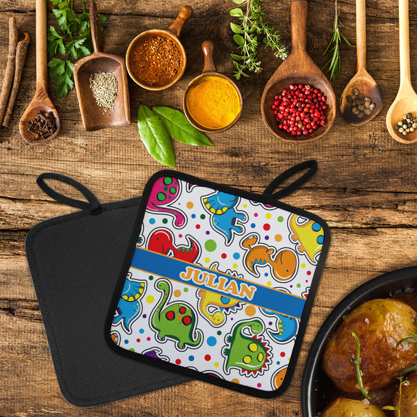 Dinosaur Print Neoprene Pot Holder - Set of 2  LIFESTYLE (Flatlay)