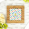 Dots & Dinosaur Bamboo Trivet with 6" Tile - LIFESTYLE