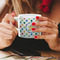Dots & Dinosaur Espresso Cup - 6oz (Double Shot) LIFESTYLE (Woman hands cropped)
