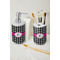 Houndstooth w/Pink Accent Ceramic Bathroom Accessories - LIFESTYLE (toothbrush holder & soap dispenser)