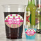 Pink Monsters & Stripes Plastic Shot Glasses - In Context