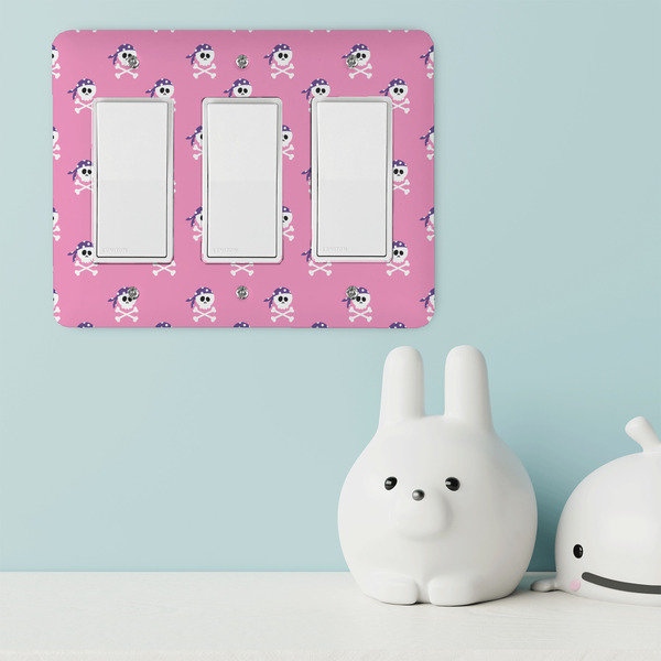 Pink Pirate Rocker Light Switch Covers - Triple - IN CONTEXT