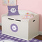 Gingham Print Round Wall Decal on Toy Chest