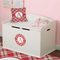 Red & Tan Plaid Round Wall Decal on Toy Chest