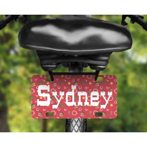 Red Western Mini License Plate on Bicycle