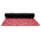 Red Western Yoga Mat Rolled up Black Rubber Backing