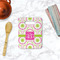 Pink & Green Suzani Rectangle Trivet with Handle - LIFESTYLE