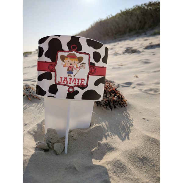 Cowprint Cowgirl Beach Spiker white on beach with sand