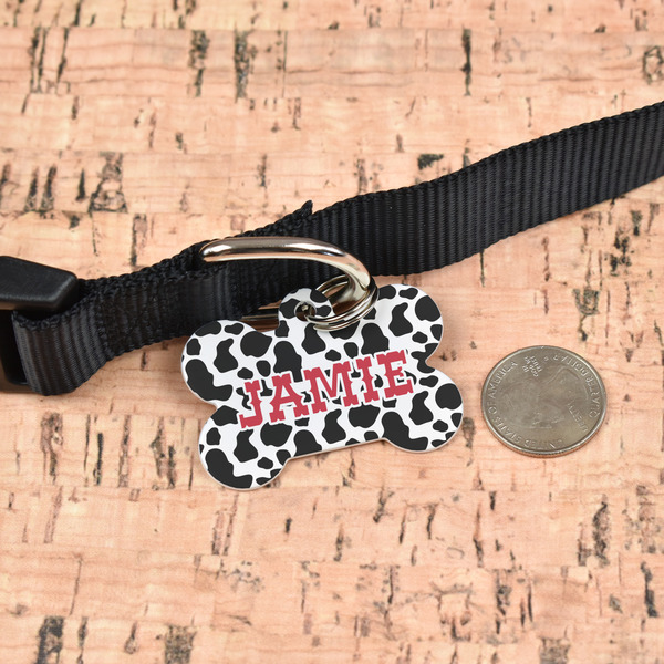 Cowprint Cowgirl Bone Shaped Dog ID Tag - Large - In Context
