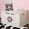 Cowprint Cowgirl Round Wall Decal on Toy Chest